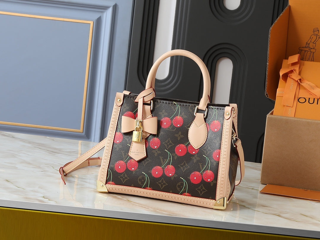 TM Cherry Monogram Hansbag