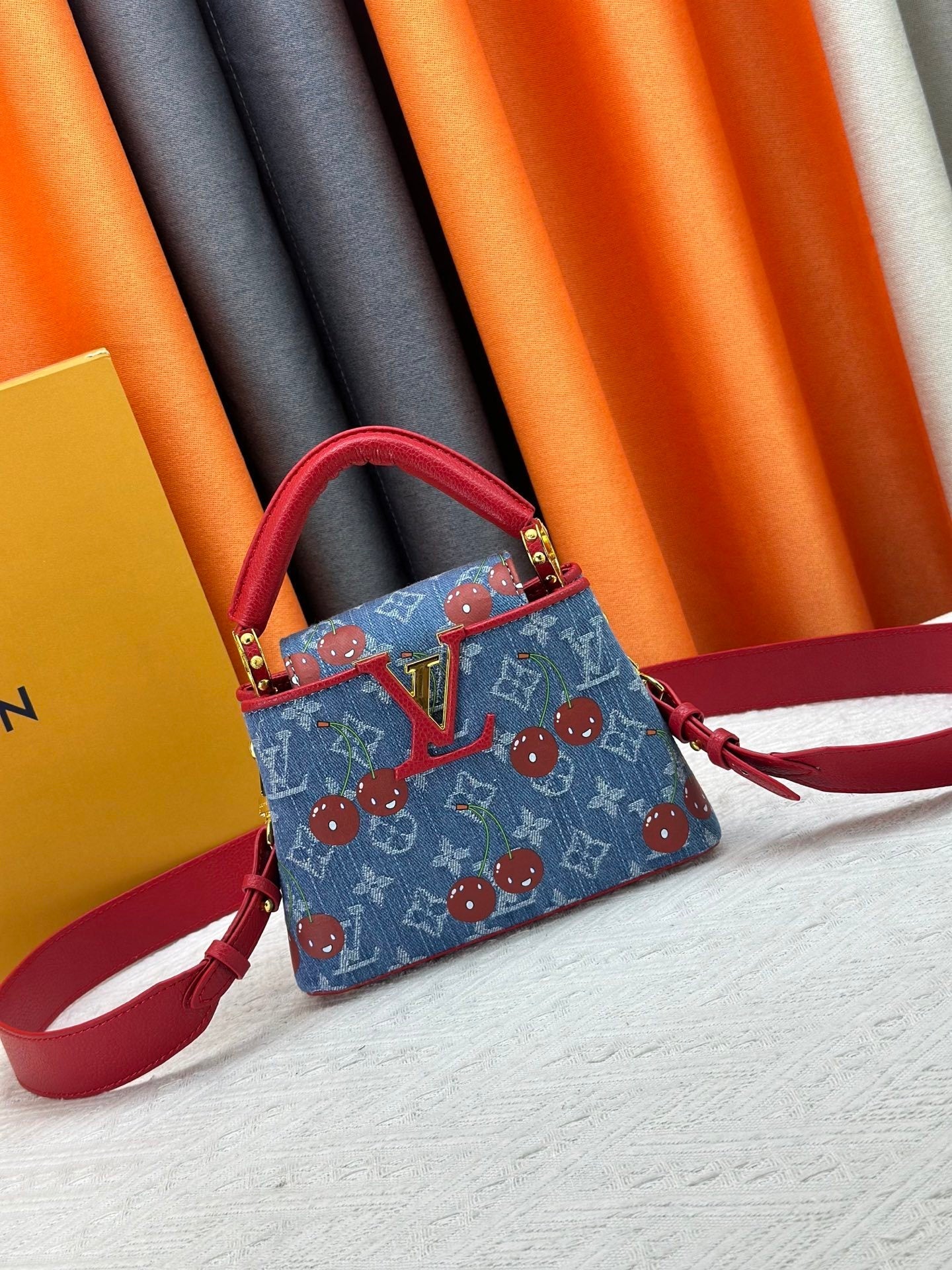 Denim Cherry Capucines Handbag