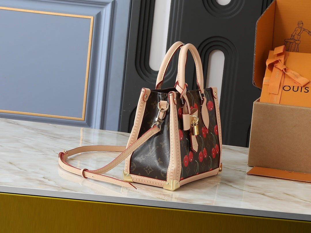 TM Cherry Monogram Hansbag